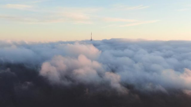 TV tower with cloudy and foggy sky