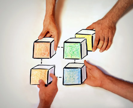 concept picture addressing blockchain interoperability with four hands holding colorful blocks