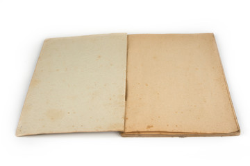 Old open grunge notebook with blank pages on a white