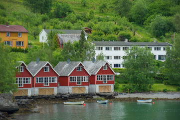 Fototapeta na wymiar Fisherman's houses in the port of Flam Norway