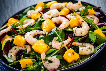 Prawn salad on black stone plate