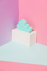 Summer party composition on a pink geometric background with plastic blue cloud. Good night dreaming concept