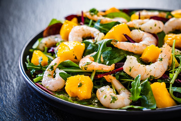 Prawn salad on black stone plate