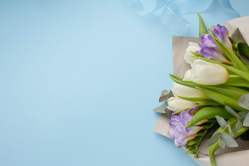 bouquet with white tulips, eucalyptus and lilac freesia