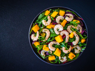 Prawn salad on black stone plate