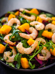Prawn salad on black stone plate