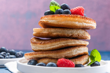 Pile of Pancakes Crepes Served with Fresh Fruits. Shrove Tuesday