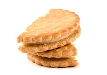 sandwich crackers on a white background. Pieces and crumbs of cookies.