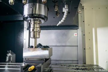 The CNC milling machine rough cutting  the injection mold parts by indexable  endmill tools. The...