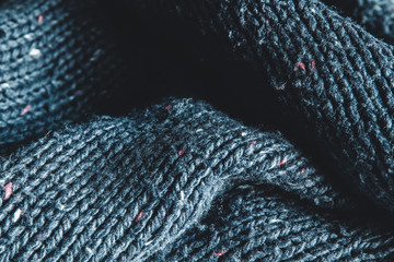 close up blue knitted pullover background