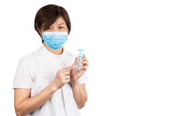 Asian woman recommends facemask and hand sanitizer for protection against virus germs