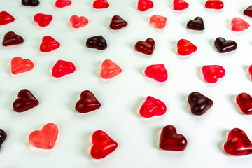 Heart shaped jelly candies on white background