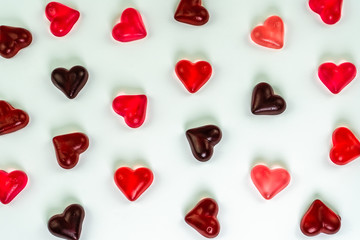 Fototapeta na wymiar Heart shaped jelly candies on white background