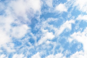 Blue sky with delicate cirrocumulus clouds. Beautiful sky background