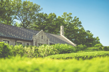 spring to autumn season travel activity from vintage building in european architecture style with beautiful gardening outdoor background