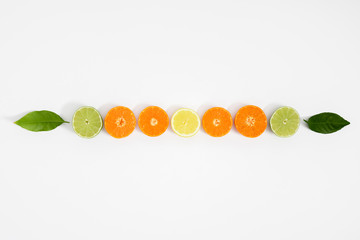 Citrus fruits pattern. Exotic fruits on white background. lemon, grapefruit, orange, lime, tangerine, fruit slices. Flat lay, top view, copy space