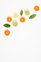 Citrus fruits pattern. Exotic fruits on white background. lemon, grapefruit, orange, lime, tangerine, fruit slices. Flat lay, top view, copy space
