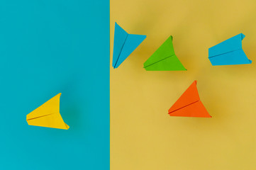 paper planes on colorful paper background, Business competition concept