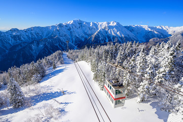 Shin-Hotaka Ropeway climbs up the top of Hotaka mountain in winter season, Okuhida, Gifu, Japan