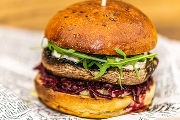 Sandwich hamburger with and mix of vegetables. Fast food. Delicious hamburger
