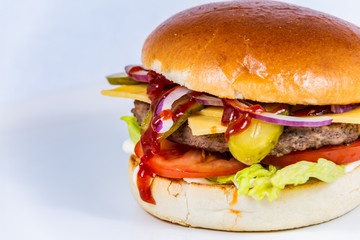 Sandwich hamburger with and mix of vegetables. Fast food. Delicious hamburger