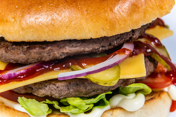 Sandwich hamburger with and mix of vegetables. Fast food. Delicious hamburger