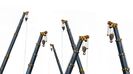 scale model of yellow tower crane isolated on white background