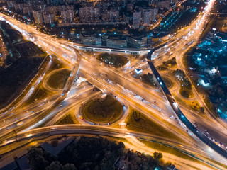 Fototapeta na wymiar An aerial view of multilevel road junction taken with a drone in Moscow, Russia