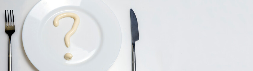 The concept of diet and healthy lifestyle. On the table is a top view of a plate in which...