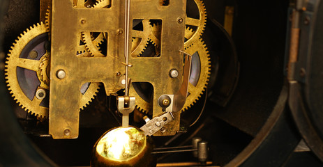 close up of Brass gears of antique watches.