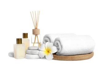 Fototapeta na wymiar Beautiful spa composition with reed diffuser on white background
