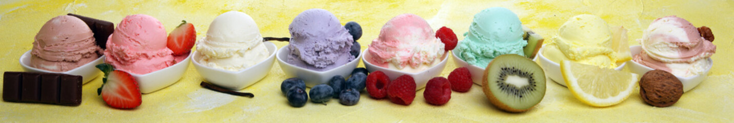 Various of ice cream flavor whit fresh blueberry, strawberry, kiwi, lemon, vanilla setup on rustic background . Summer and Sweet cold ice cream
