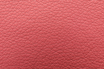 Texture of pink leather as background, closeup