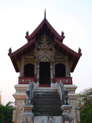 Fototapeta premium Temple in Chiangmai Thailand Beautifully decorated with wonderful colours statues of Buddha, Payanak, and Monks on walking street in the old city