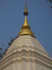Fototapeta premium Temple in Chiangmai Thailand Beautifully decorated with wonderful colours statues of Buddha, Payanak, and Monks on walking street in the old city