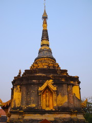 Fototapeta premium Temple in Chiangmai Thailand Beautifully decorated with wonderful colours statues of Buddha, Payanak, and Monks on walking street in the old city