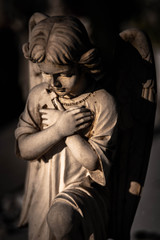 Praying sweet angel figurine.
