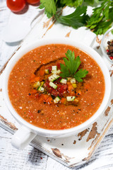 cold tomato soup in a bowl, vertical top view