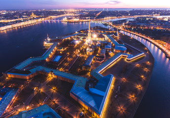 Beautiful night view of Saint-Petersburg, Russia, Peter and Paul Fortress with cityscape and scenery beyond the city