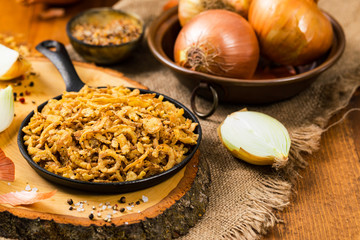 Crispy Fried Onion Strings Background. Selective focus.