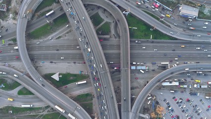 Top Down View Overpass Road Day Traffic in Kiev. Aerial Shot of Highway with Cars and Trucks. Drone Flight over Ukraine Capital Two Level Junction. Big City Sight
