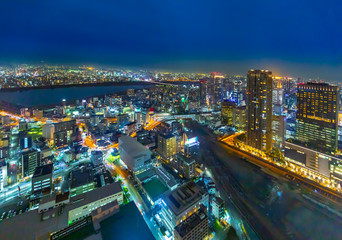 Fototapeta na wymiar Beautiful Osaka city aerial night light view with the river, Japan