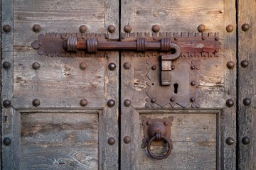 ancient lock on a wooden door