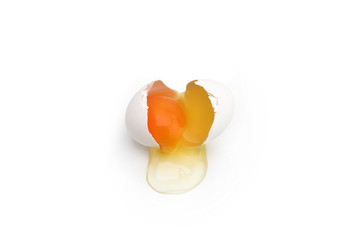 Broken chicken egg isolated on white background. Close up © Hypnosis