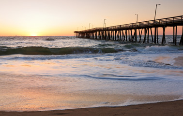 Fishing Pier at Sunrise at Virginia Beach, Virginia, USA. Virginia Beach, a coastal city in...
