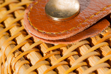 Close up, detail of wickerwork women bag texture made from bamboo. Rivet in bag, macro, close up