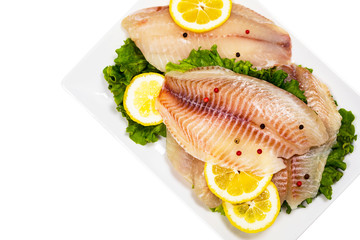Whitefish Tilapia Fish Raw Fillet Isolated on White Background. Selective focus.