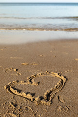 love heart drawn on sand