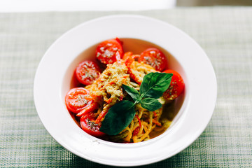 raw zucchini paste with tomatoes and Basil. raw food. vegan food