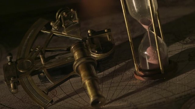 time is running out sextant hourglass old map